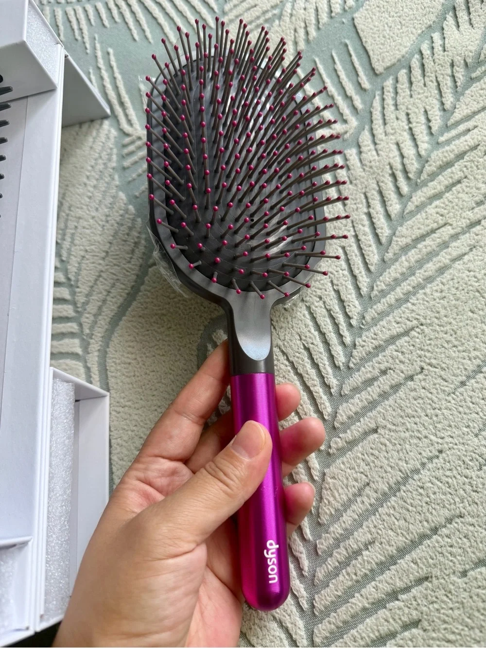 Dyson pink paddle brush with grey cushion